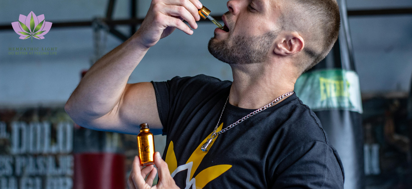 Homem toma óleo de CBD pela forma sublingual